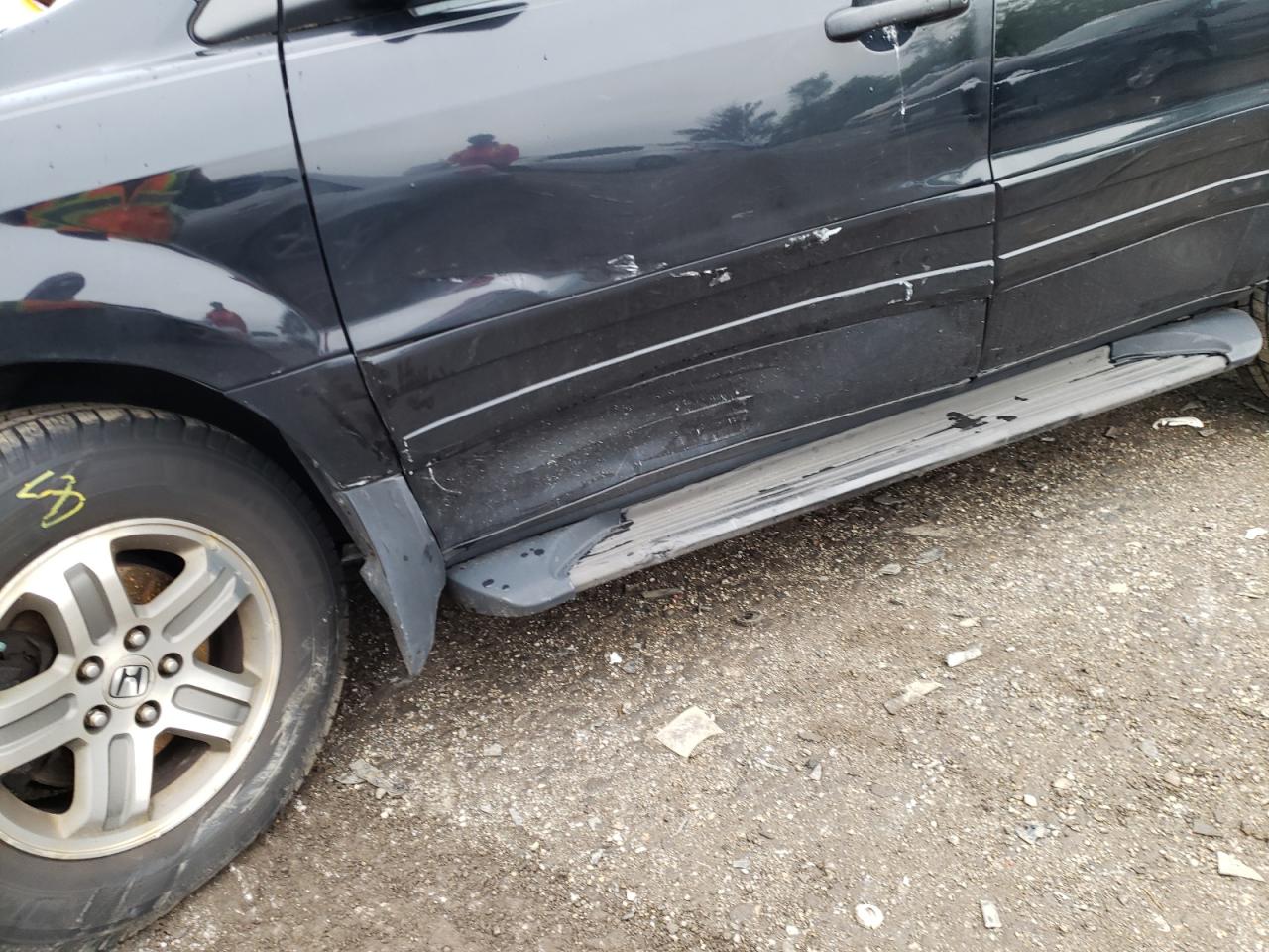 Photo 9 from auction – 2004 HONDA PILOT EXL with VIN 2HKYF18644H511011
