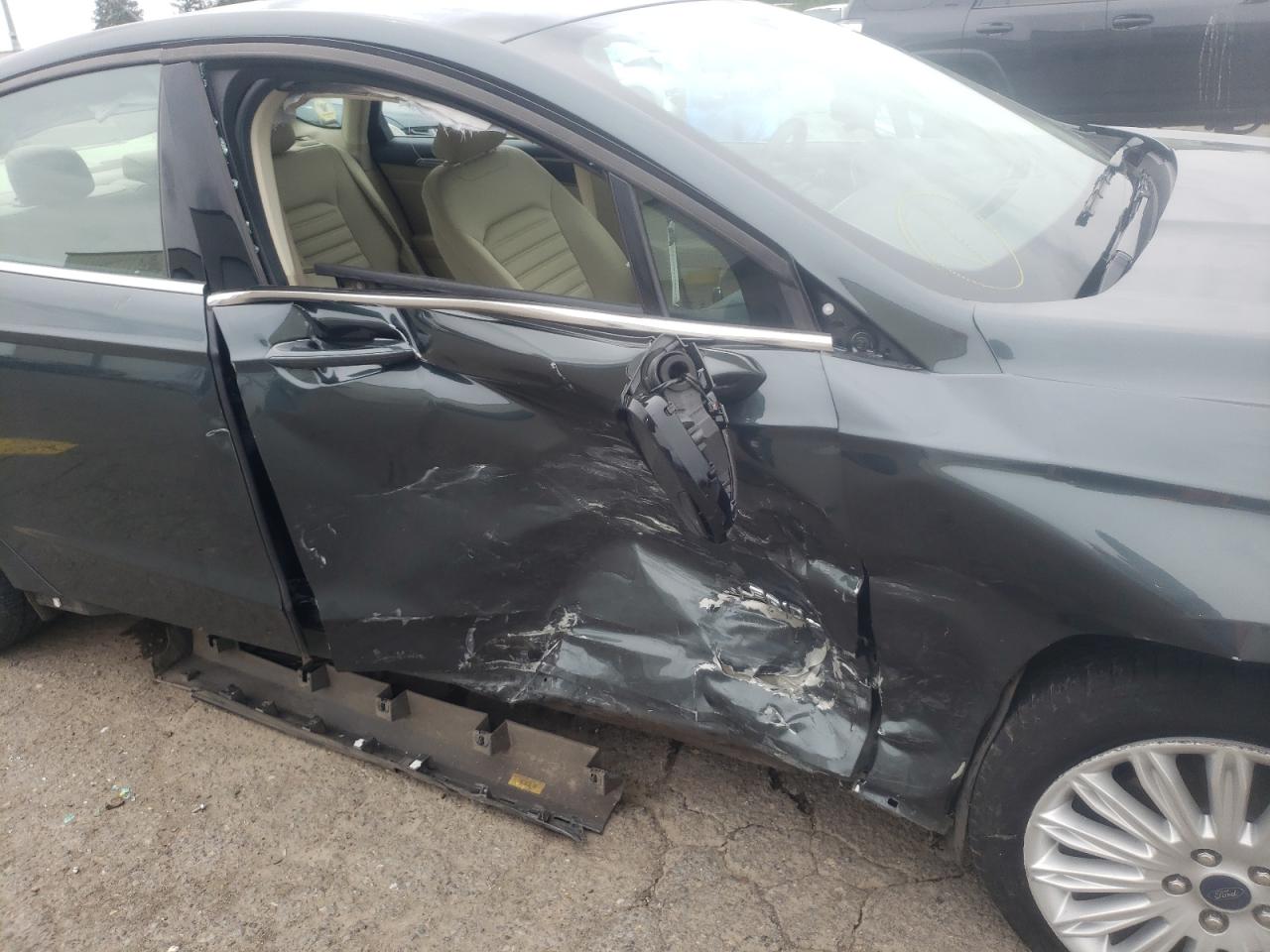 Photo 9 from auction – 2015 FORD FUSION SE with VIN 3FA6P0LU0FR161452