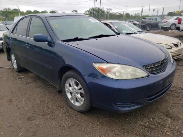 TOYOTA CAMRY LE 2003 with VIN 4T1BE30K93U664853 - Photo from auction