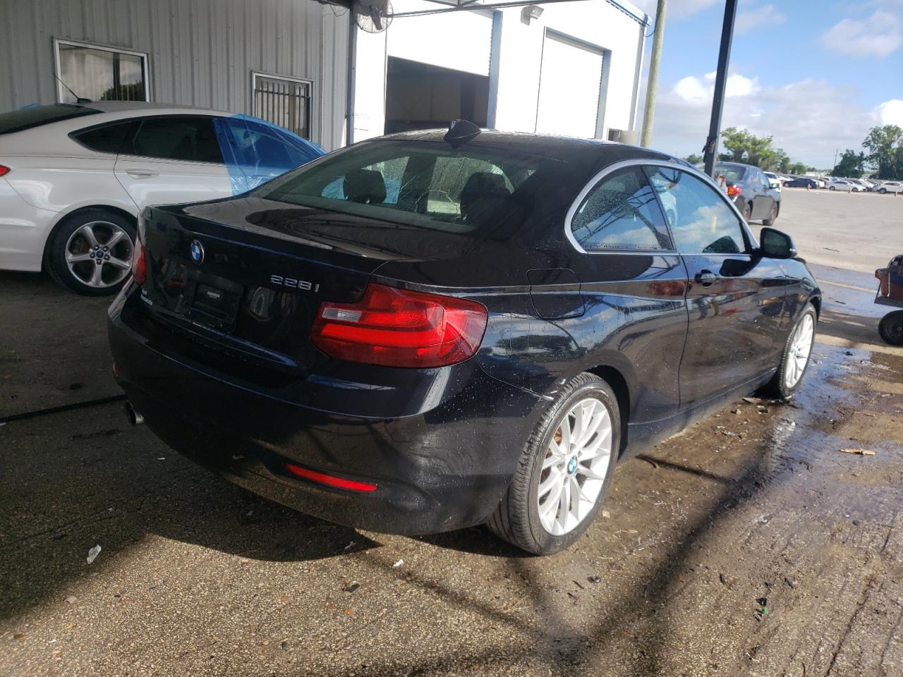 Photo 4 from auction – 2014 BMW 228 I with VIN WBA1F5C54EVV98995