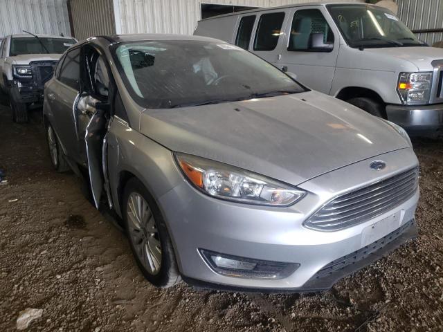 FORD FOCUS TITA 2017 with VIN 1FADP3N28HL303231 - Photo from auction