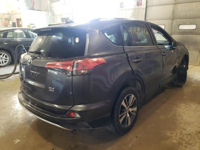 Photo 4 from auction – 2016 TOYOTA RAV4 XLE with VIN 2T3RFREV5GW464051