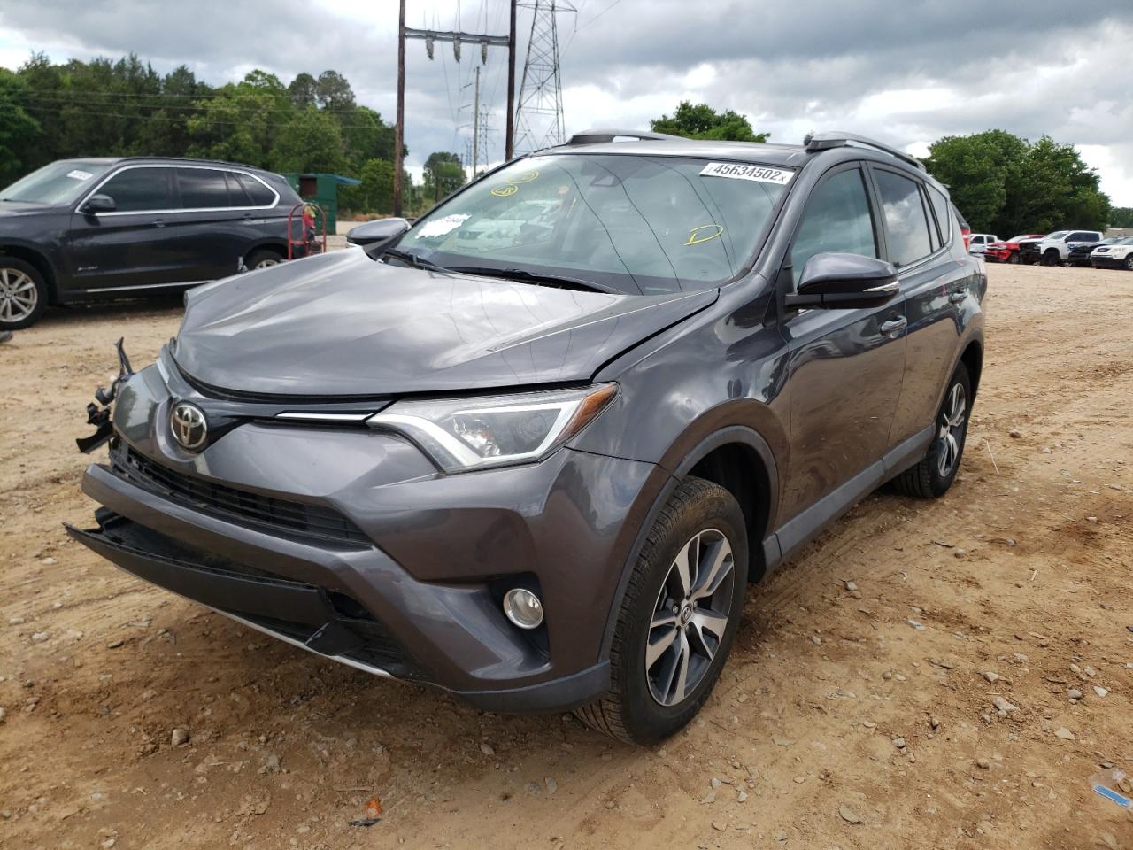 Photo 2 from auction – 2017 TOYOTA RAV4 XLE with VIN 2T3WFREV1HW403218