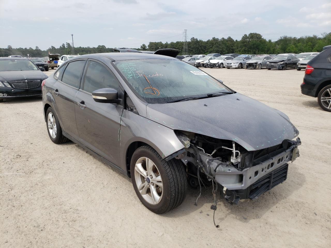 FORD FOCUS SE 2014 with VIN 1FADP3F27EL348574 - Photo from auction