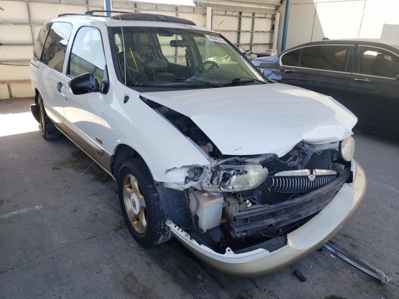MERCURY VILLAGER E 2000 with VIN 4M2XV14T0YDJ23001 - Photo from auction