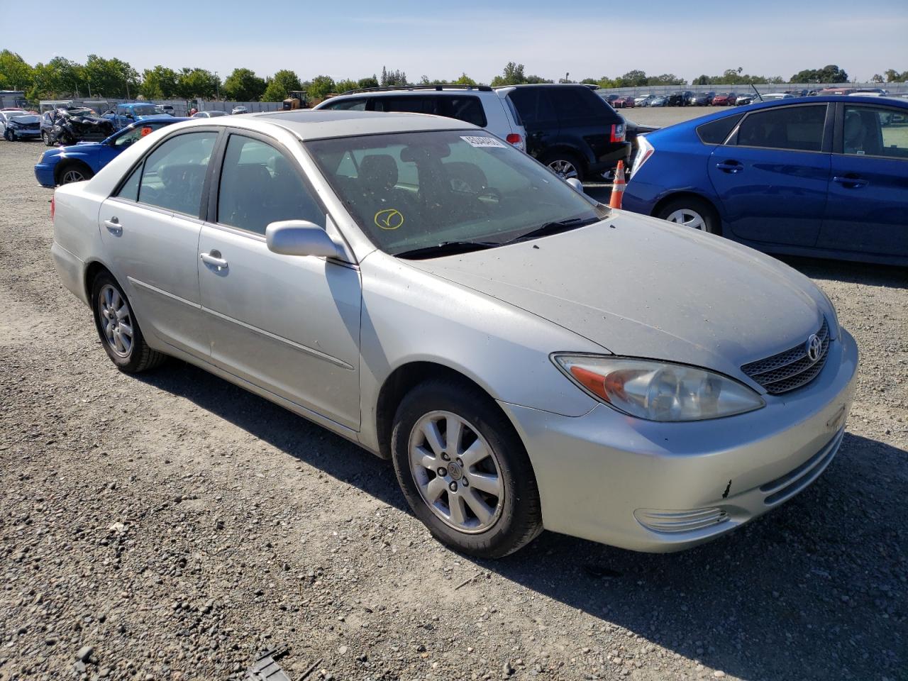 TOYOTA CAMRY LE 2002 with VIN JTDBF30K420029160 - Photo from auction