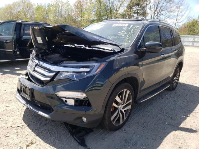 Photo 2 from auction – 2016 HONDA PILOT TOUR with VIN 5FNYF6H97GB035234