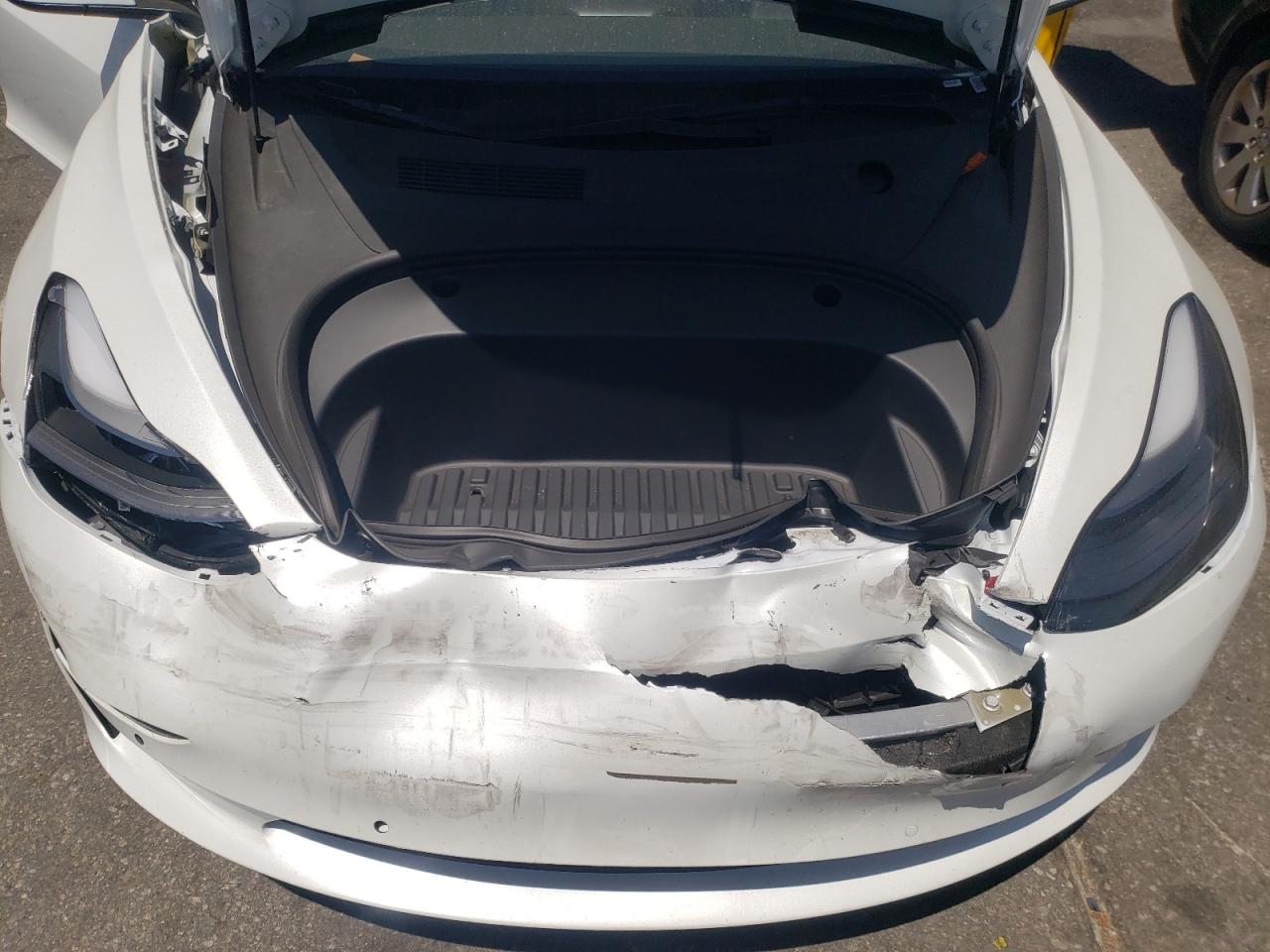 Photo 7 from auction – 2022 TESLA MODEL 3 with VIN 5YJ3E1EA3NF144110