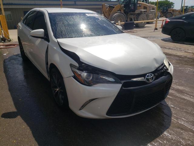 TOYOTA CAMRY LE 2015 with VIN 4T1BF1FKXFU059768 - Photo from auction