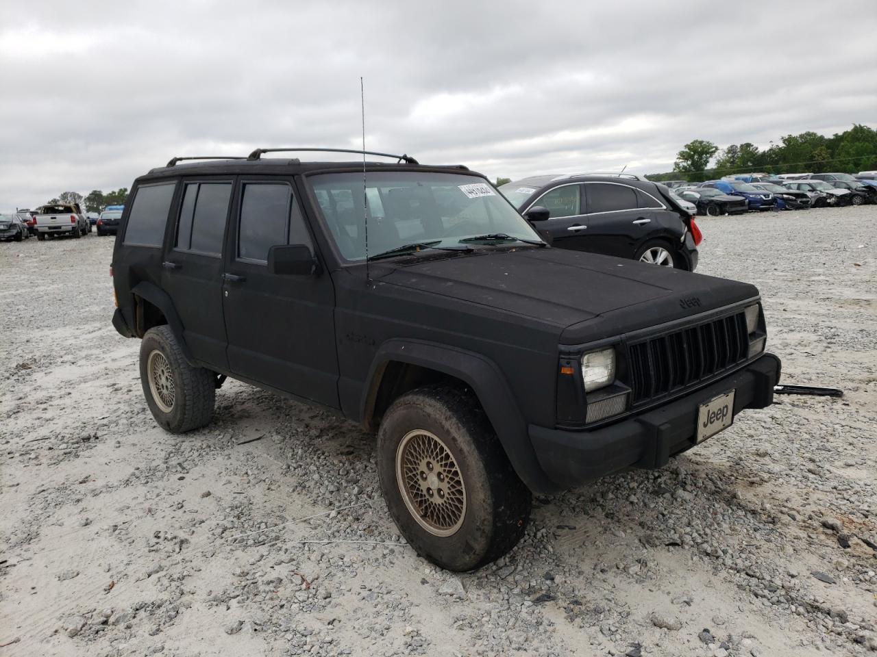 JEEP CHEROKEE C 1996 with VIN 1J4FJ78S2TL311447 - Photo from auction