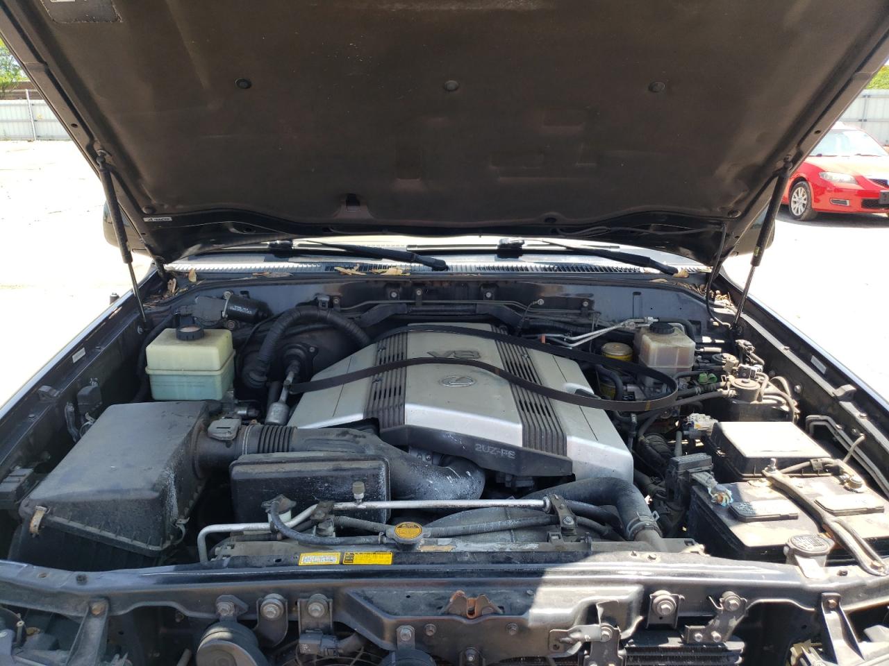 Photo 7 from auction – 2001 LEXUS LX 470 with VIN JTJHT00W213509955