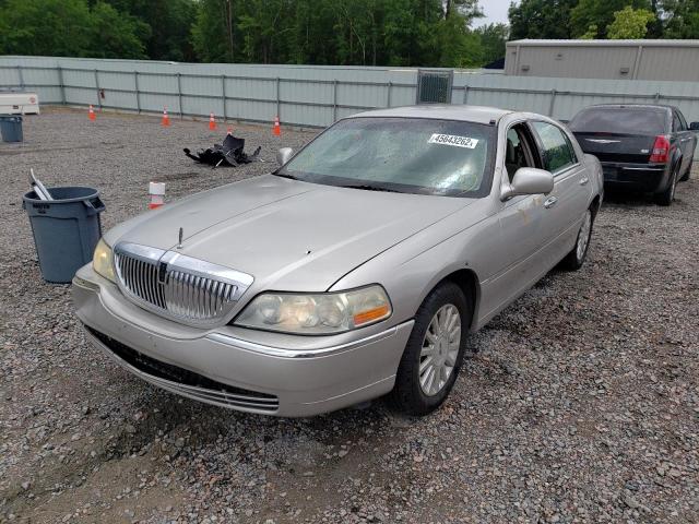 Photo 2 from auction – 2003 LINCOLN TOWN CAR E with VIN 1LNHM81W23Y618950