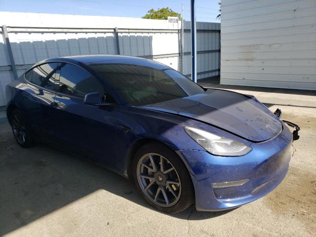TESLA MODEL 3 2021 with VIN 5YJ3E1EB0MF003664 - Photo from auction