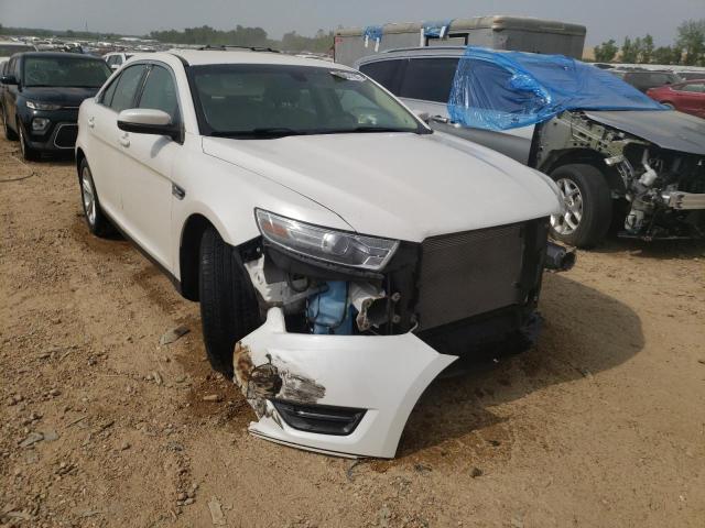 FORD TAURUS SEL 2014 with VIN 1FAHP2E85EG119272 - Photo from auction