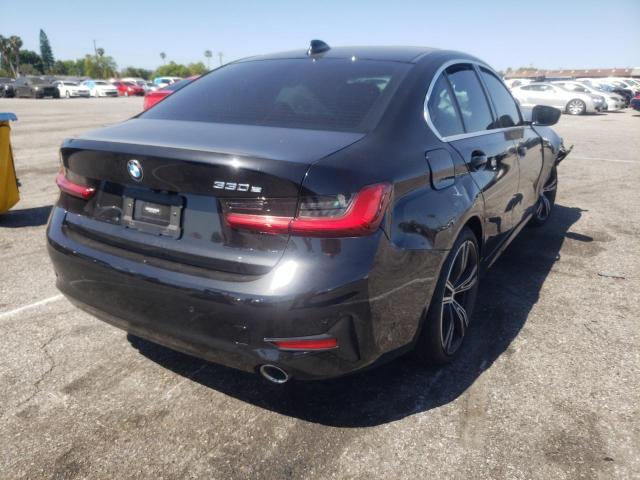 Photo 4 from auction – 2021 BMW 330E with VIN 3MW5P7J04M8B57189