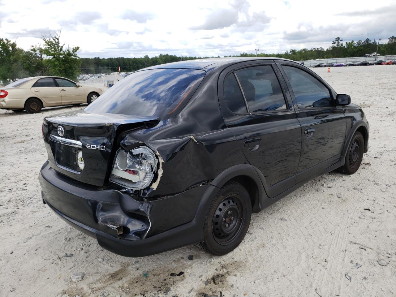 Photo 4 from auction – 2003 TOYOTA ECHO with VIN JTDBT123335044014