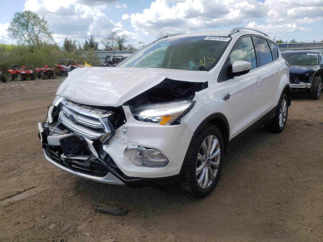 Photo 2 from auction – 2017 FORD ESCAPE TIT with VIN 1FMCU0JD5HUD82545