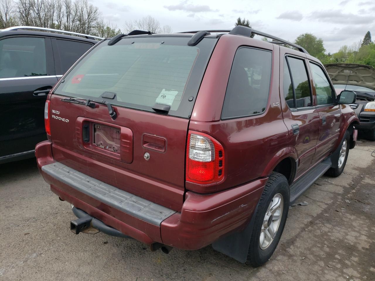 Photo 4 from auction – 2002 ISUZU RODEO S with VIN 4S2DM58W524312360