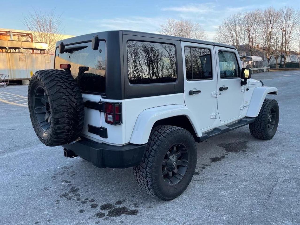 Photo 4 from auction – 2014 JEEP WRANGLER U with VIN 1C4HJWEG7EL128864