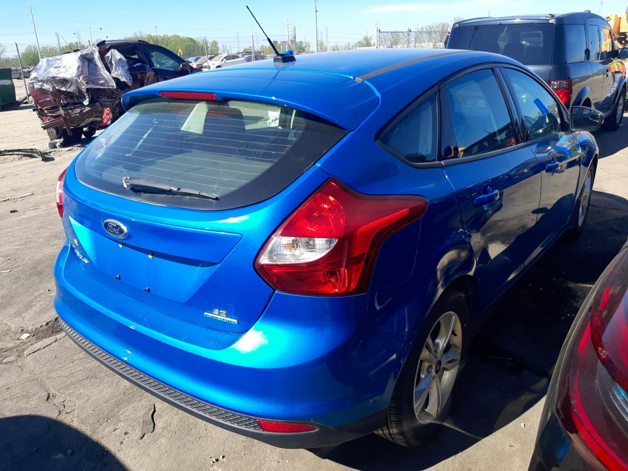 Photo 4 from auction – 2014 FORD FOCUS SE with VIN 1FADP3K25EL270205