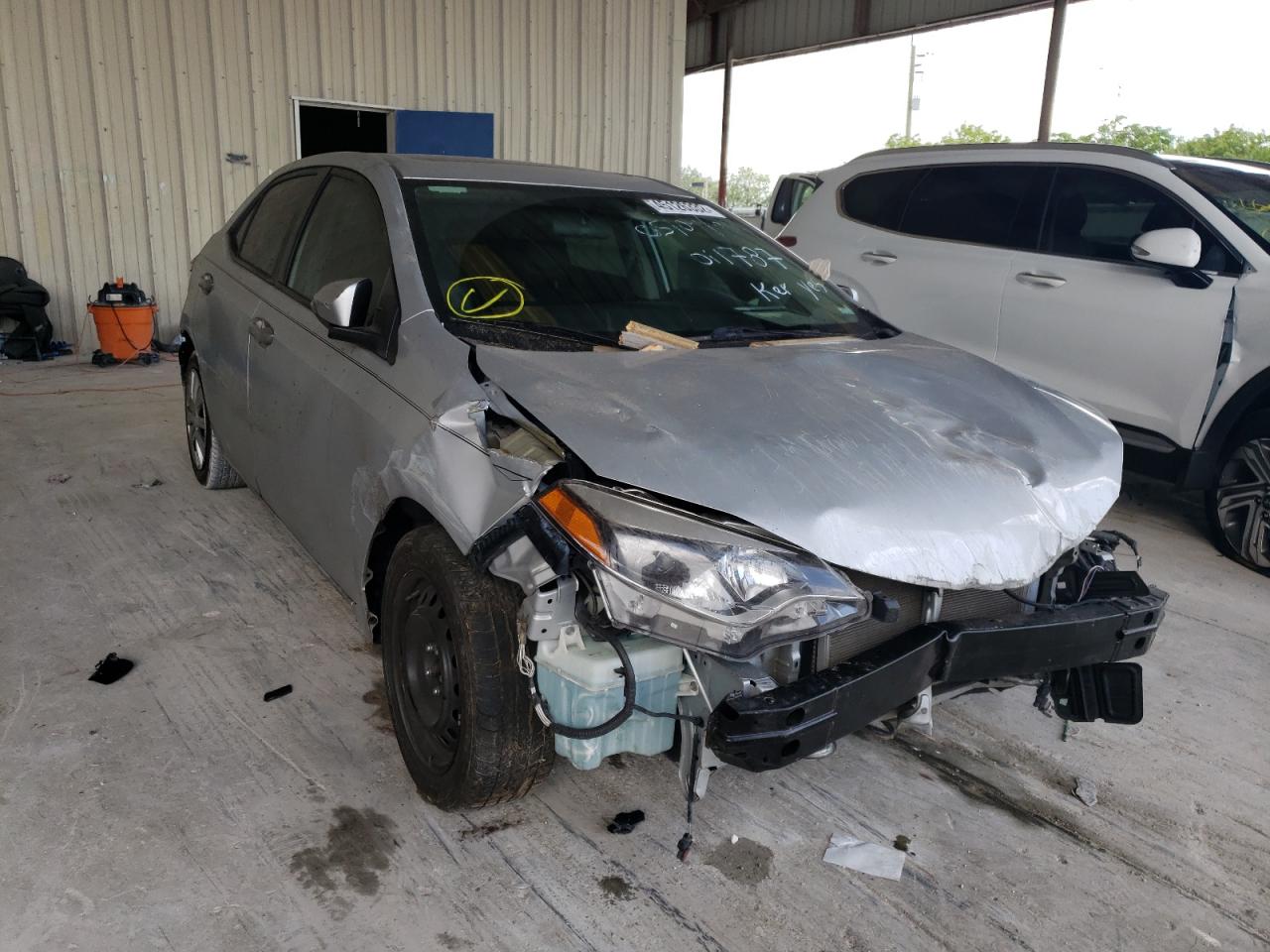 TOYOTA COROLLA L 2014 with VIN 2T1BURHE0EC011787 - Photo from auction