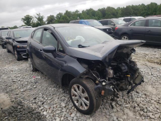 FORD FIESTA SE 2011 with VIN 3FADP4EJ2BM142118 - Photo from auction