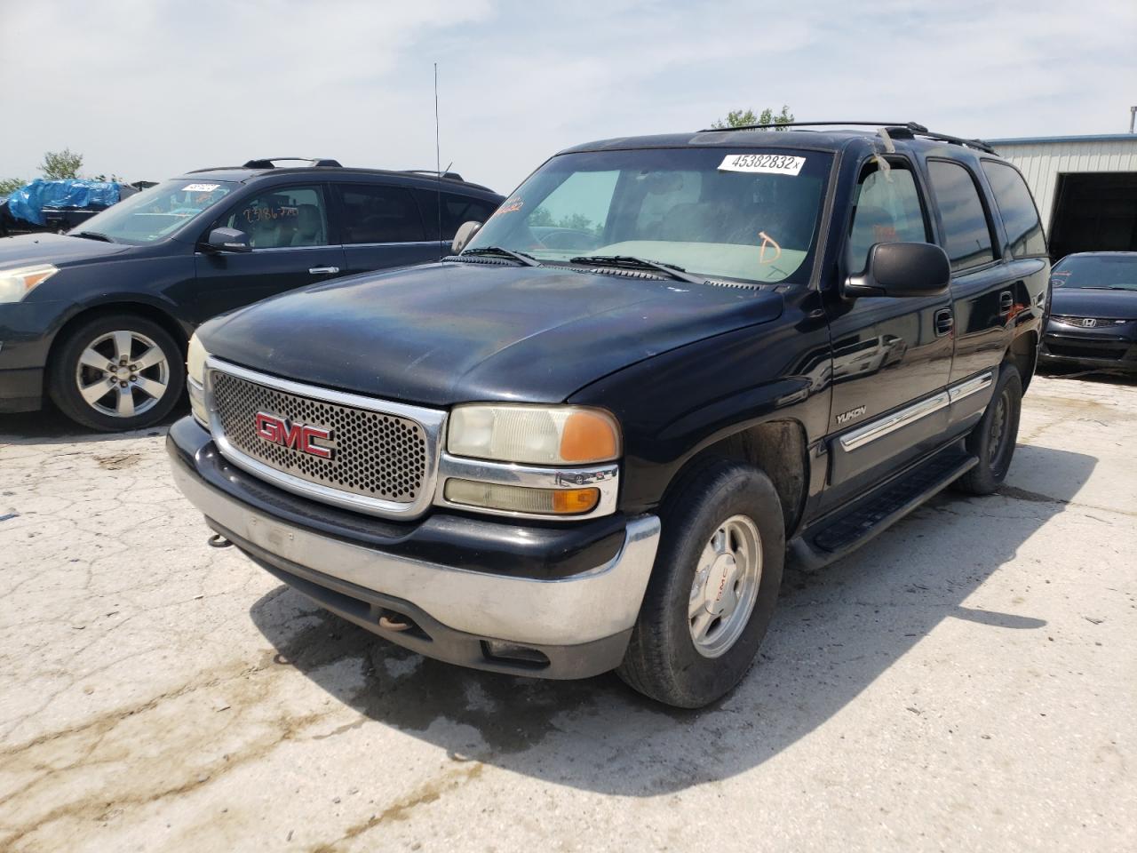 Photo 2 from auction – 2001 GMC YUKON with VIN 1GKEC13T91R216682
