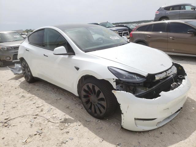 TESLA MODEL Y 2022 with VIN 7SAYGDEF8NF323355 - Photo from auction