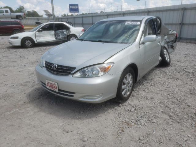 Photo 2 from auction – 2002 TOYOTA CAMRY LE with VIN 4T1BF30KX2U026459