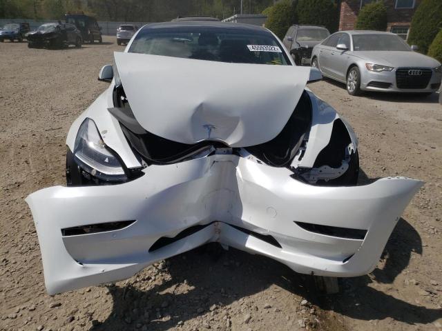 Photo 9 from auction – 2021 TESLA MODEL 3 with VIN 5YJ3E1EA7MF100285