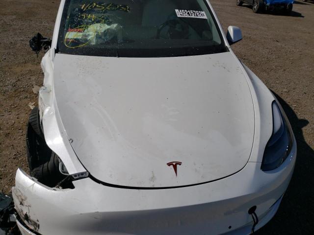 Photo 7 from auction – 2021 TESLA MODEL Y with VIN 5YJYGDEFXMF277863