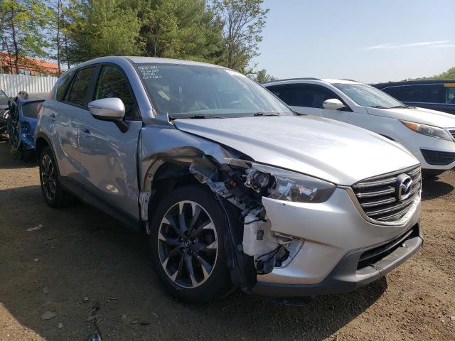 MAZDA CX-5 GT 2016 with VIN JM3KE4DY5G0871267 - Photo from auction