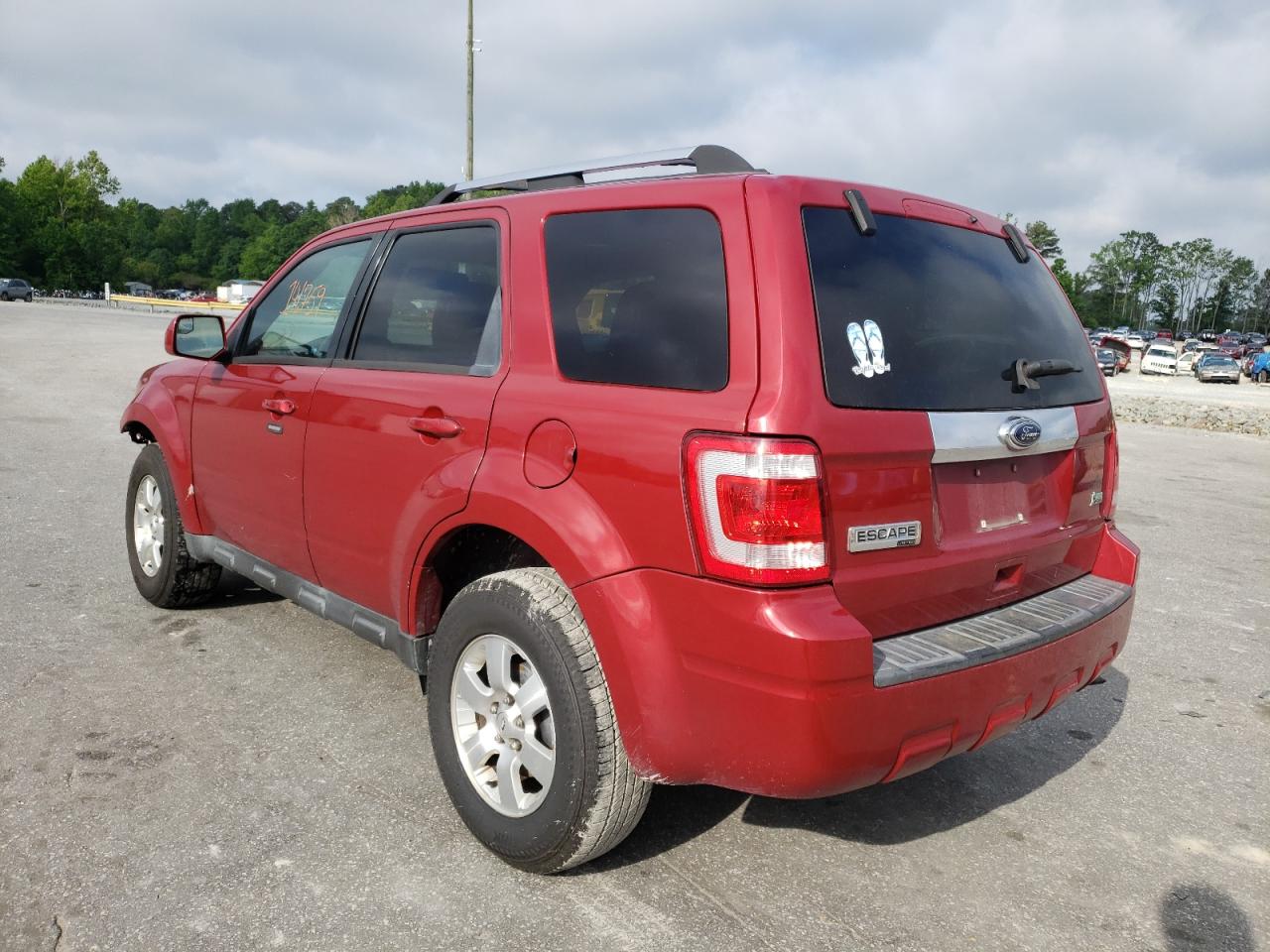 Photo 3 from auction – 2010 FORD ESCAPE LIM with VIN 1FMCU0EG3AKC77721