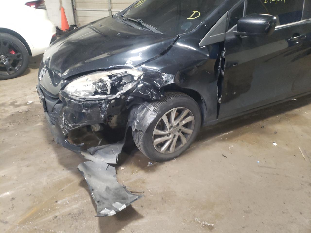 Photo 9 from auction – 2012 MAZDA 5 with VIN JM1CW2BL4C0121410