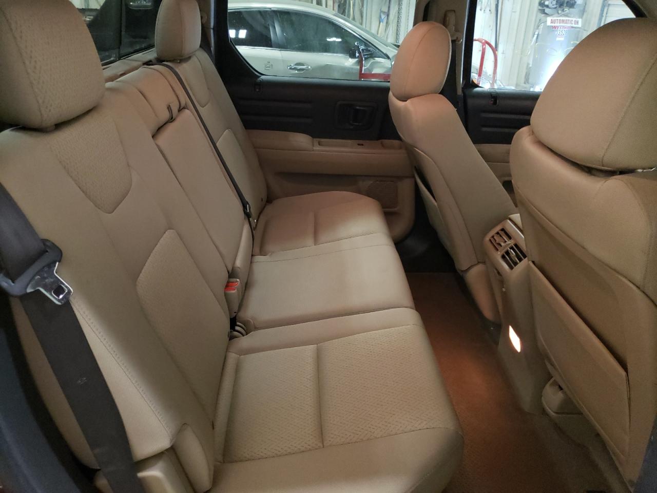 Photo 6 from auction – 2010 HONDA RIDGELINE with VIN 5FPYK1F21AB002183