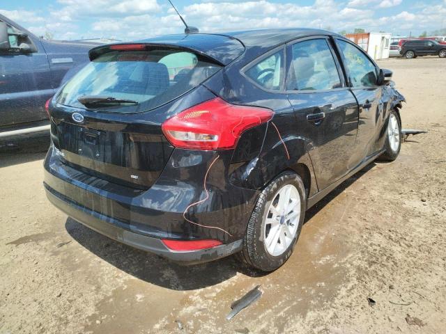 Photo 4 from auction – 2016 FORD FOCUS SE with VIN 1FADP3K25GL272152