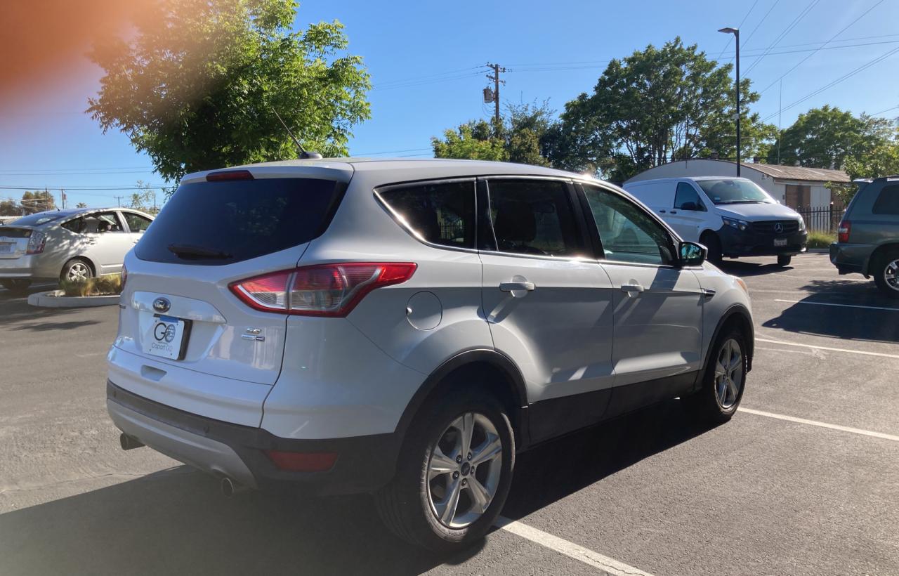 Photo 4 from auction – 2013 FORD ESCAPE SE with VIN 1FMCU9G92DUD41503