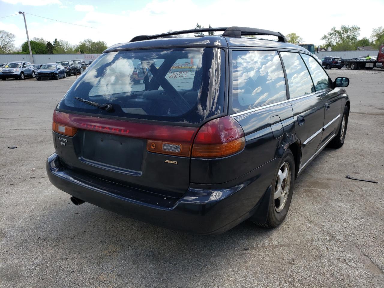 Photo 4 from auction – 1997 SUBARU LEGACY L with VIN 4S3BK4357V7302157