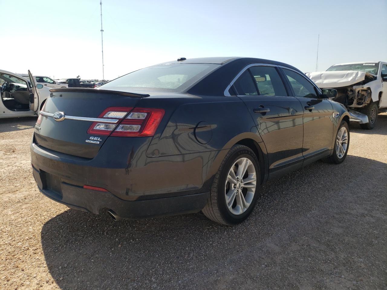 Photo 4 from auction – 2013 FORD TAURUS SEL with VIN 1FAHP2E88DG149557