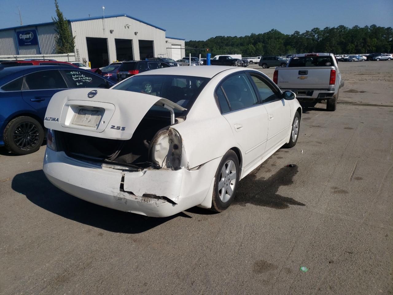 Photo 17 from auction – 2003 NISSAN ALTIMA BAS with VIN 1N4AL11D33C252479