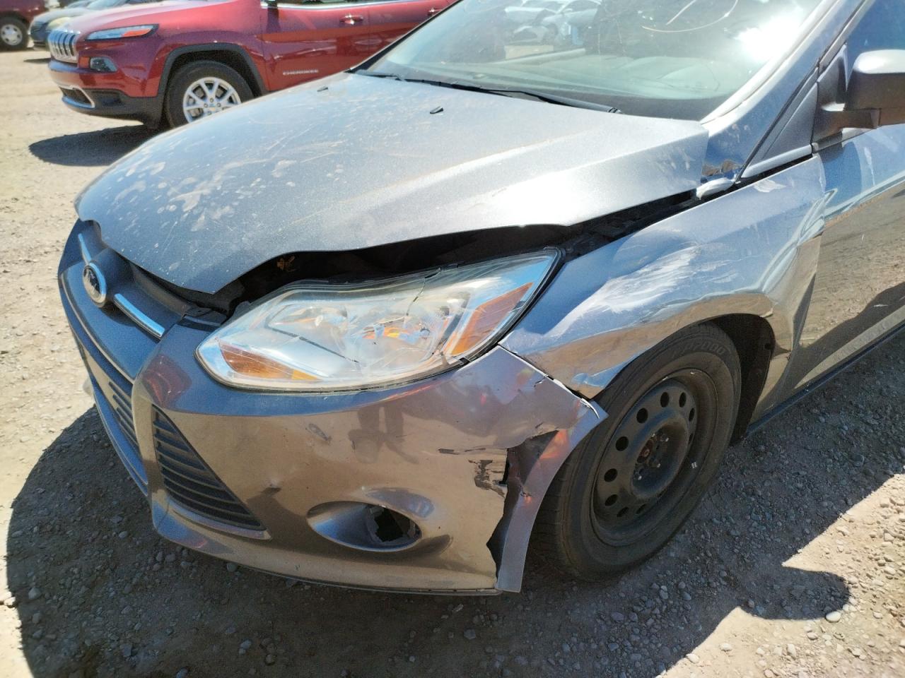 Photo 9 from auction – 2014 FORD FOCUS S with VIN 1FADP3E22EL451449