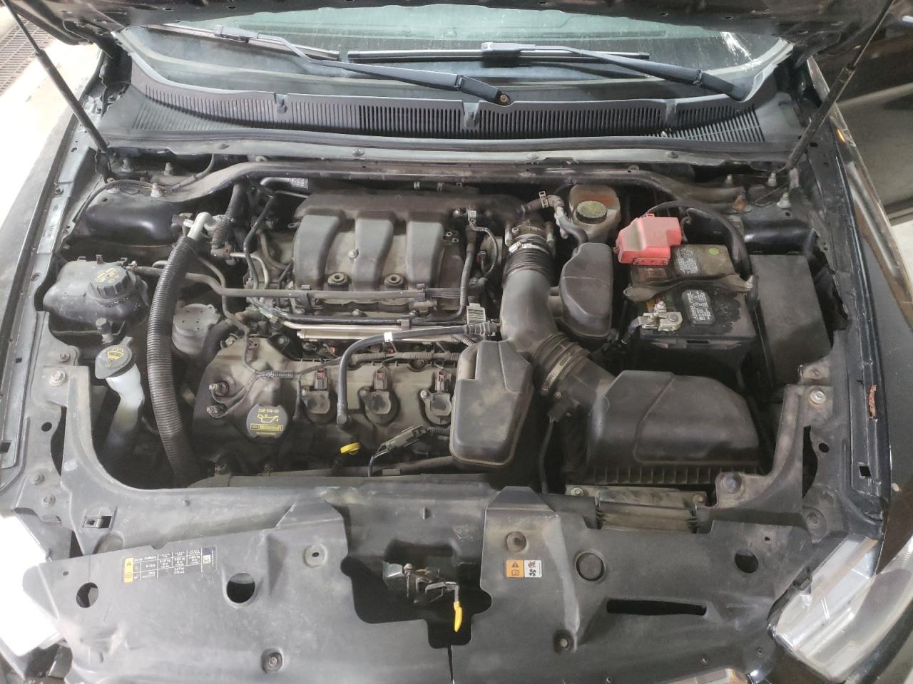 Photo 7 from auction – 2013 FORD TAURUS SEL with VIN 1FAHP2E87DG231490