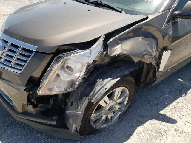Фото 9 с аукциона – 2014 CADILLAC SRX с VIN 3GYFNAE3XES630235