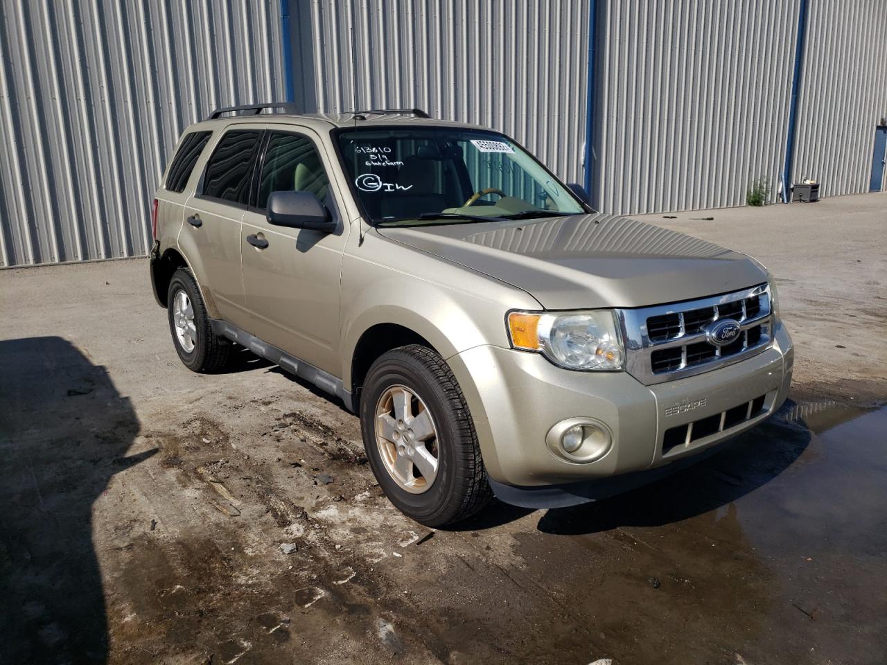 FORD ESCAPE XLT 2011 with VIN 1FMCU0DG9BKB65928 - Photo from auction