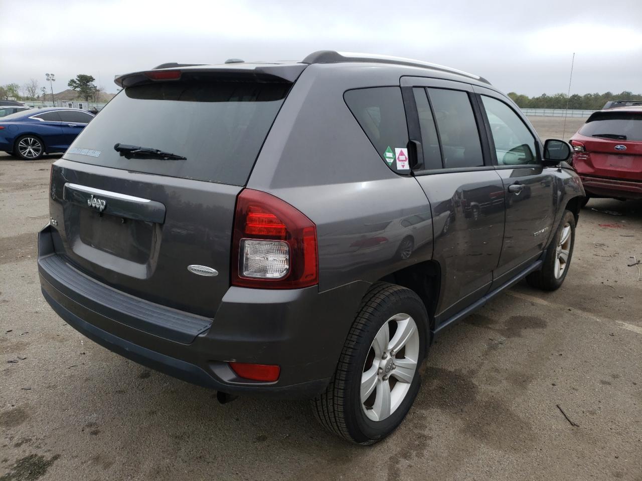 Photo 4 from auction – 2014 JEEP COMPASS LA with VIN 1C4NJDEB1ED858789