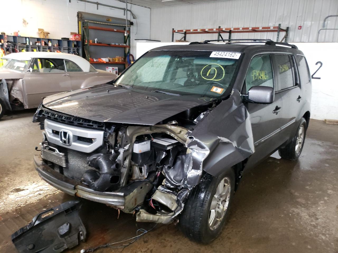 Photo 2 from auction – 2011 HONDA PILOT EXL with VIN 5FNYF4H55BB087987