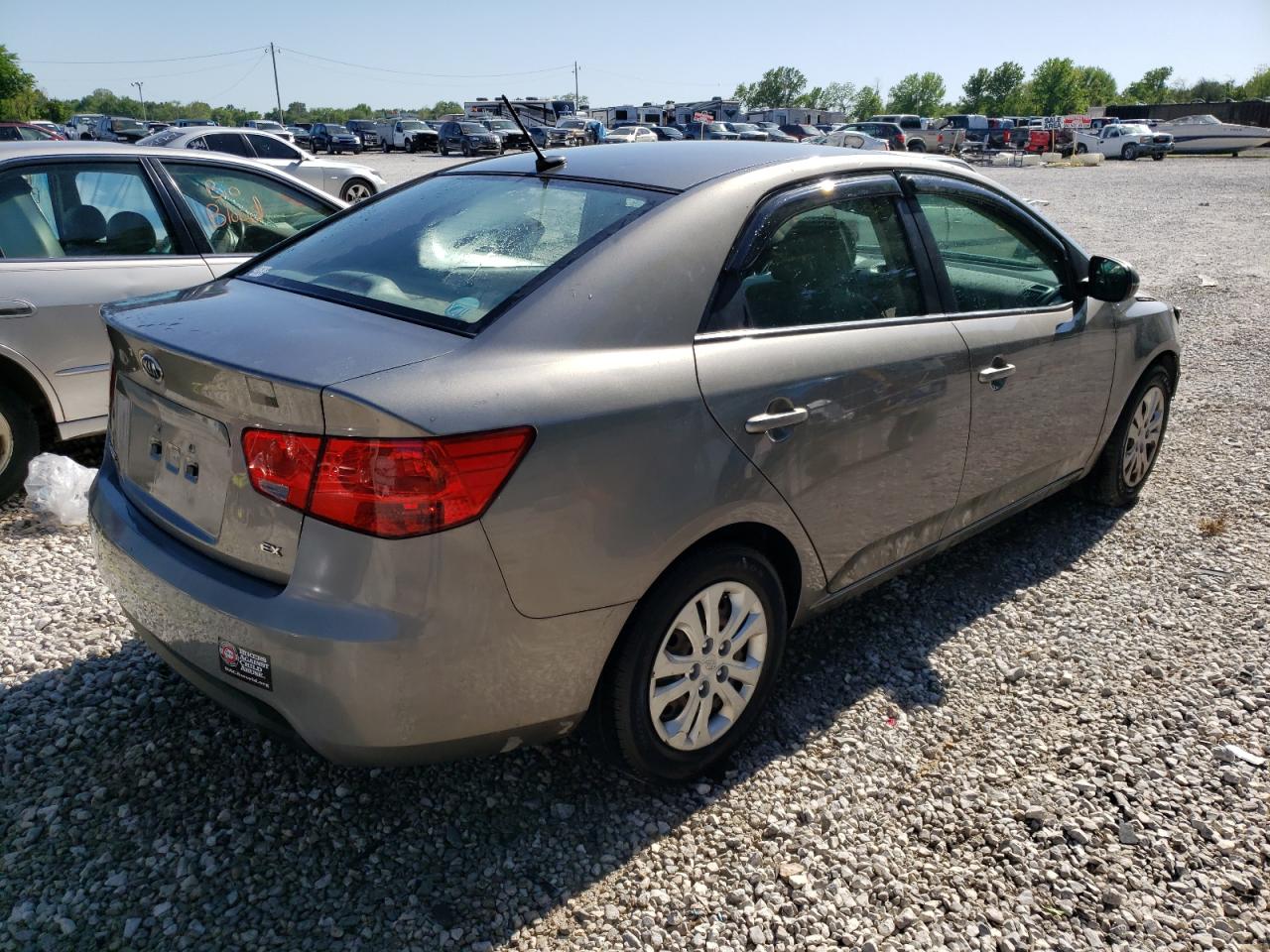Photo 15 from auction – 2011 KIA FORTE EX with VIN KNAFU4A22B5323605