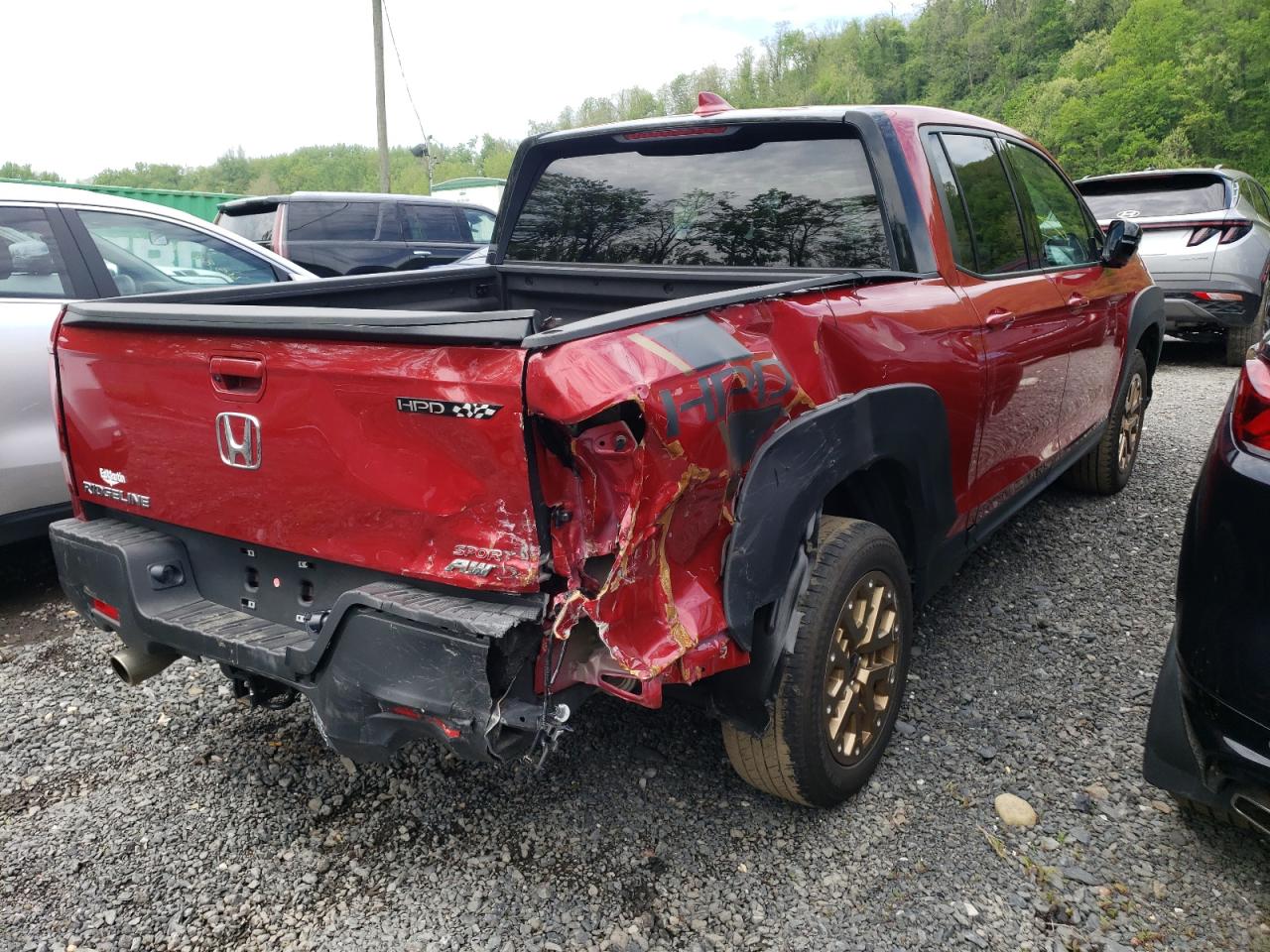Photo 4 from auction – 2021 HONDA RIDGELINE with VIN 5FPYK3F19MB007994