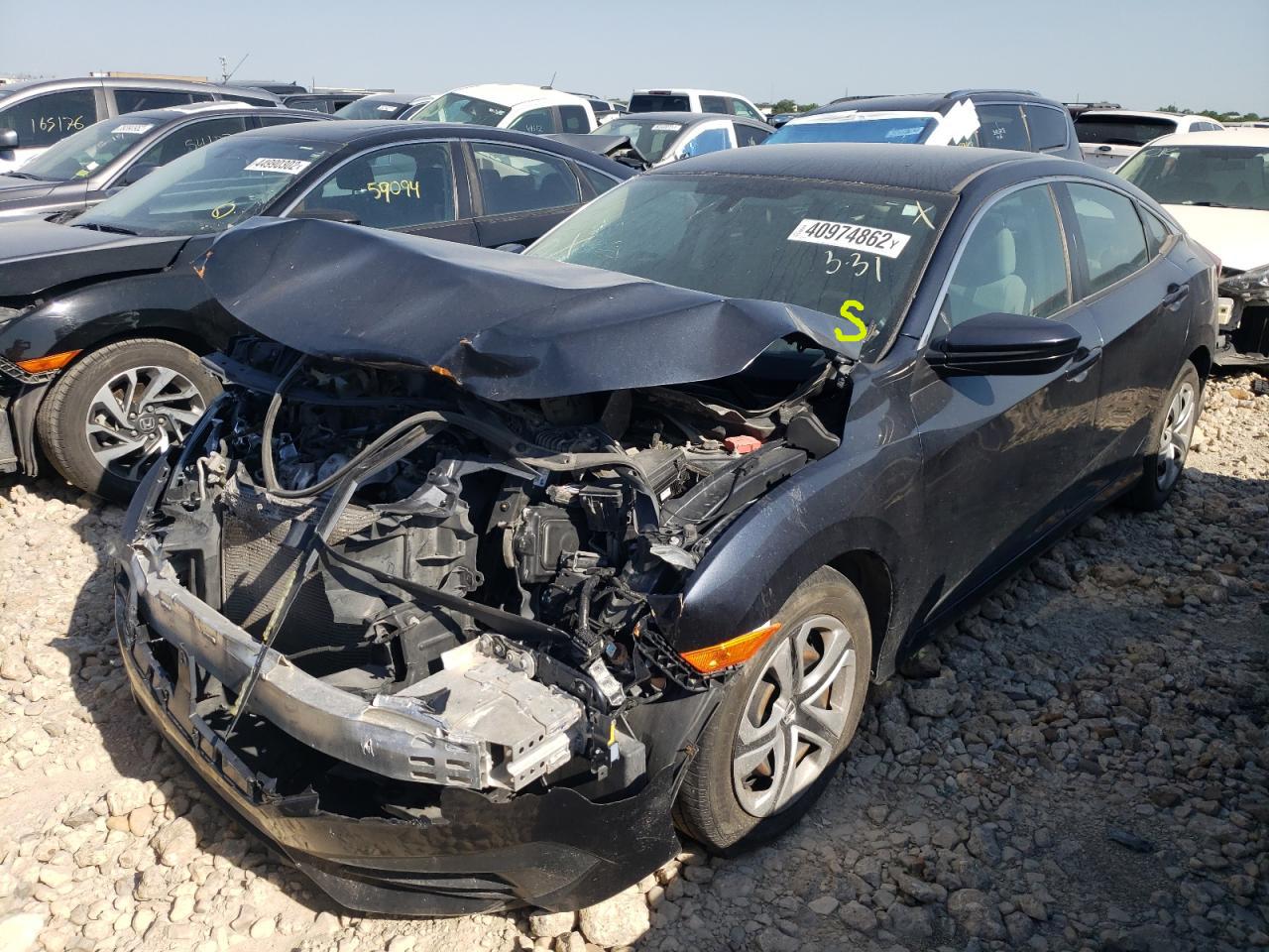 Photo 18 from auction – 2016 HONDA CIVIC LX with VIN 19XFC2F51GE008822