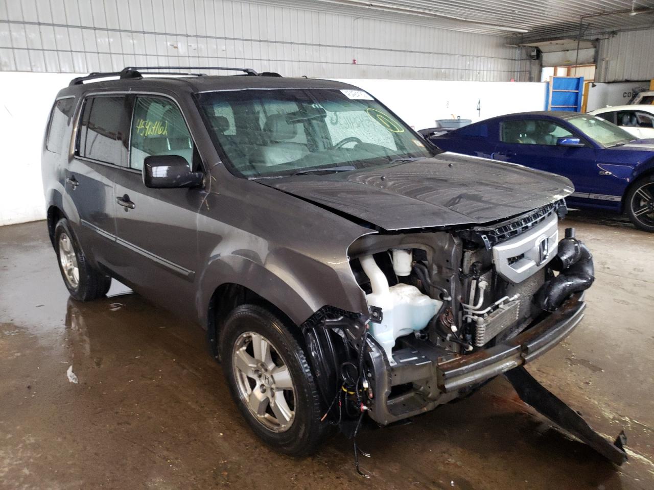 HONDA PILOT EXL 2011 with VIN 5FNYF4H55BB087987 - Photo from auction